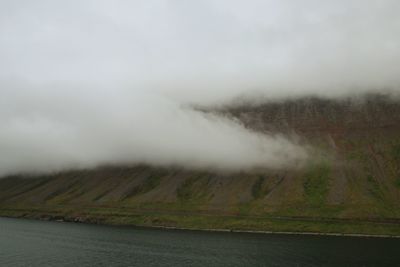 Scenic view of land against sky