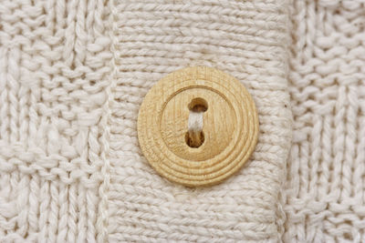 Close-up of sweater button