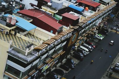 High angle view of traffic on road amidst buildings