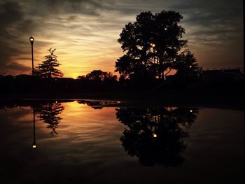 Scenic view of lake at sunset