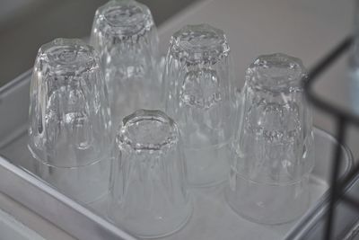 Close-up of empty drinking glass on table