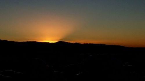 Silhouette of mountains at sunset