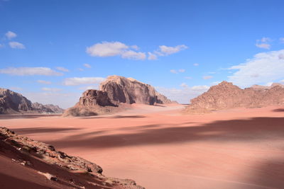 Panoramic view of desert against sky