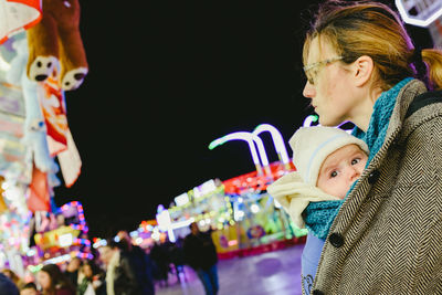 Closeup of mother and daughter outdoors