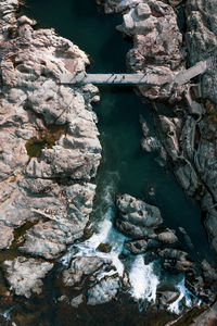 High angle view of rocks in river