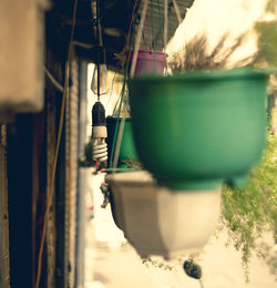 Close-up of old metal hanging on wall