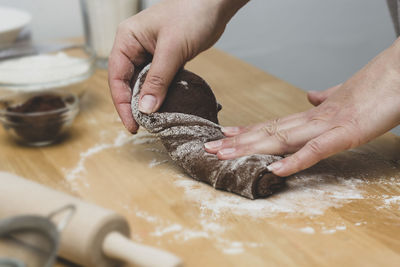 Midsection of person preparing food