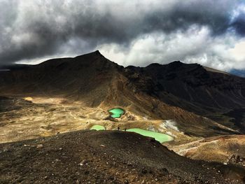 Scenic view of volcanic mountain against sky