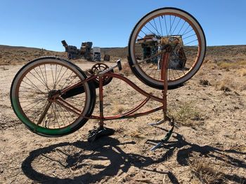 Bicycle wheel against sky