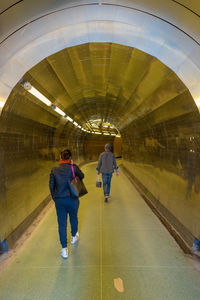 Full length of woman in tunnel