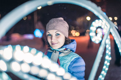 Portrait of young woman in car