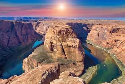 Aerial view of rock formations against sky