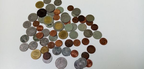 High angle view of coins on table