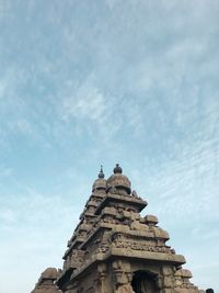 Low angle view of statue against sky