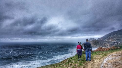 Scenic view of sea against cloudy sky