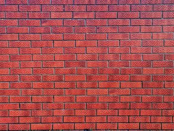 Full frame shot of red brick wall