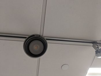 Low angle view of light fixture on ceiling