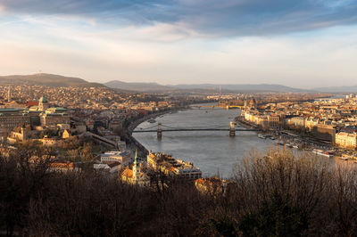 High angle view of bridge over river against cloudy sky