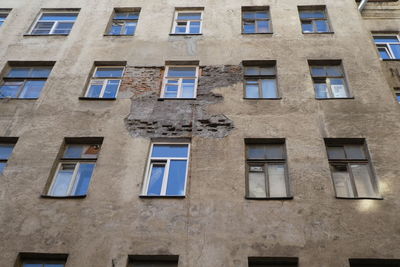 Low angle view of old building in city