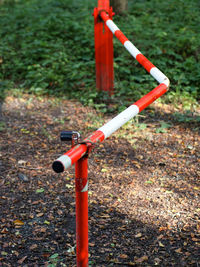 High angle view of red road sign on field