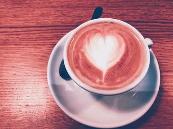 Close-up of cappuccino on table