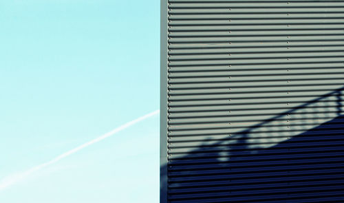 Low angle view of building against blue sky