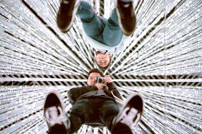 Portrait of young man photographing