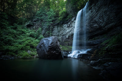 View of waterfall in forest