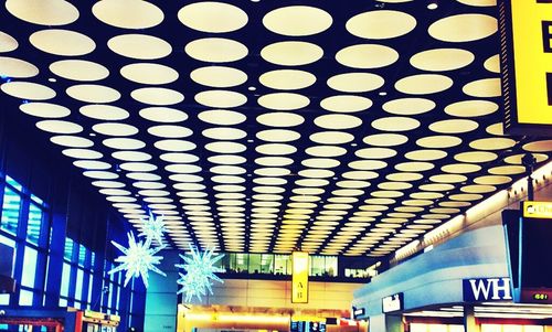 Low angle view of illuminated ceiling