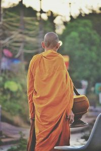 Rear view of a man in temple