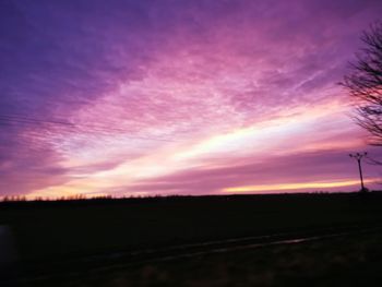 Scenic view of dramatic sky during sunset