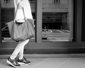 Woman standing in city