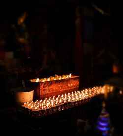 Close-up of illuminated candles