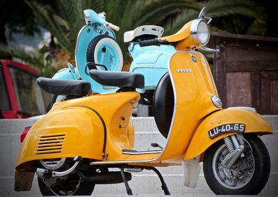 Close-up of yellow motorcycle