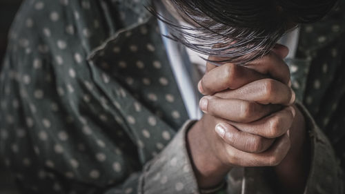 Close up of person praying