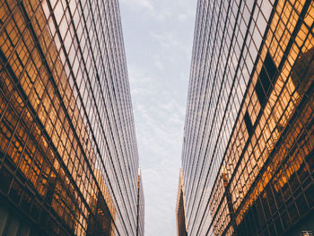 Low angle view of skyscrapers against sky