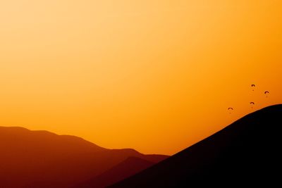 Silhouette of mountain at sunset