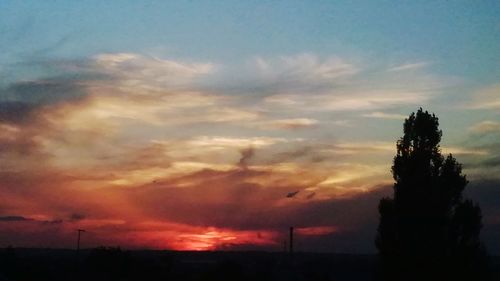 Scenic view of dramatic sky during sunset