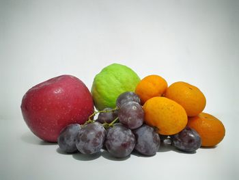 Close-up of apples against white background