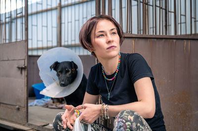 Dog at the shelter. animal shelter volunteer takes care of dogs. 