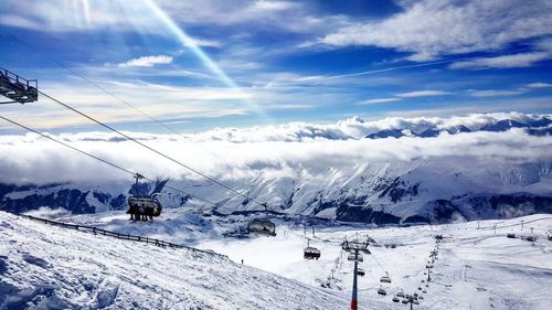 Snow covered mountains against sky