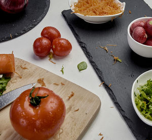 High angle view of fruits in plate on table