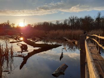 Scenic view of flood basin during sunset