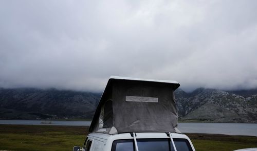 Van with sleeping cabin above