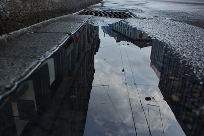 High angle view of reflection of buildings in city