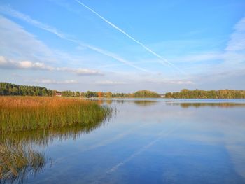 View of lake against cloudy sky