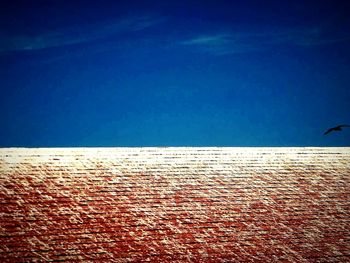 Close-up of blue sea against clear sky