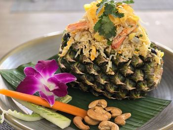 Close-up of pineapple in plate on table