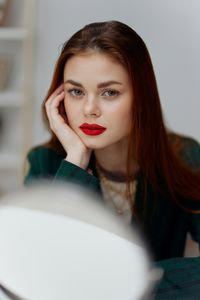 Portrait of young woman with eyes closed