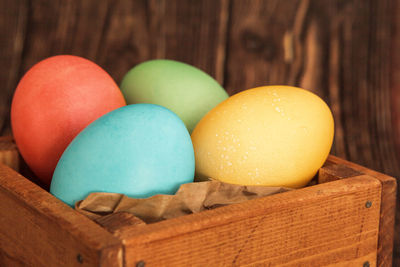 Close-up of multi colored eggs on table